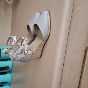 Silver gray espadrilles with wrap around ankle strap.  About 3" heel